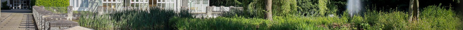 Blick über den Teich auf das Verwaltungsgebäude des LWL-Bildungszentrums